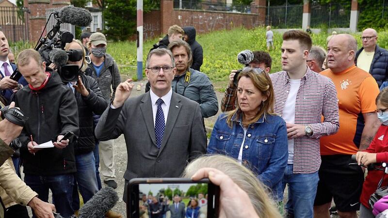 DUP leader Jeffrey Donaldson and deputy leader Paula Bradley visit the controversial Adam Street bonfire in July. Picture by Arthur Allison/Pacemaker 