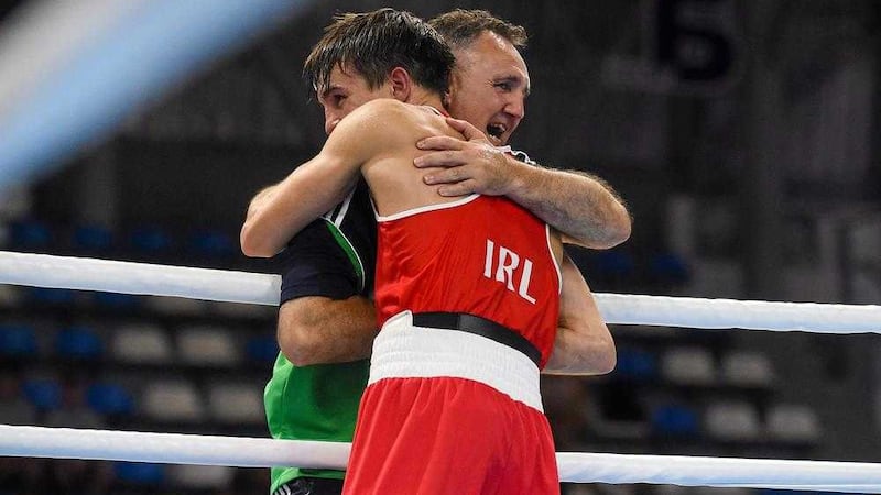 Michael Conlan celebrates another win with Billy Walsh 