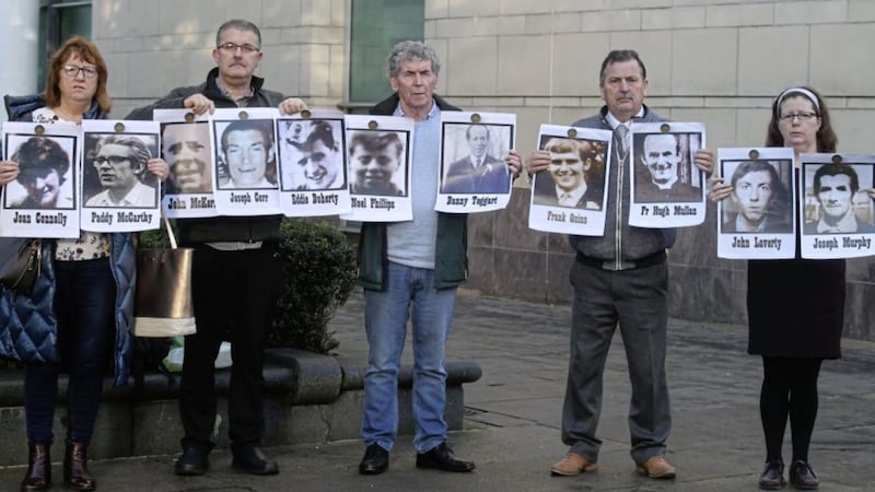 Ballymurphy families outside court in Belfast yesterday. Picture by Hugh Russell 