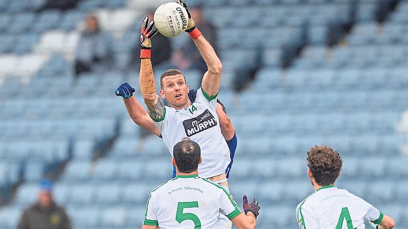 Moorefield veteran Ronan Sweeney rises highest to claim possession for his side during their last-gasp victory over St Loman&rsquo;s of Mullingar in Portlaoise yesterday&nbsp;