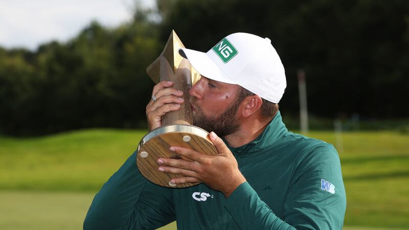 Daniel Brown kisses the trophy after winning the ISPS Handa World Invitational at the Galgorm Castle Golf Club  Picture: PA