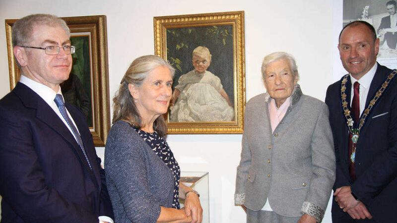 Mary Clarke, right, niece of Margaret Clarke, pictured with a painting by Margaret Clarke of her son David as a baby, at the launch of the exhibition with museum assistant curator Dr Ken Abraham, Fiana Griffin, partner of the late David Clarke and Newry, Mourne and Down District Council chairman Mickey Ruane 