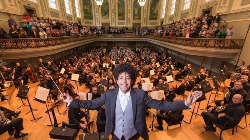 The Ulster Orchestra will mark its golden anniversary with 50 pop-up performances in and around Belfast next week 