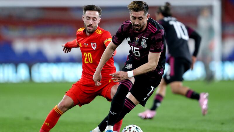Josh Sheehan (left) is back in the red jersey of Wales after two years away from international football (David Davies/PA)