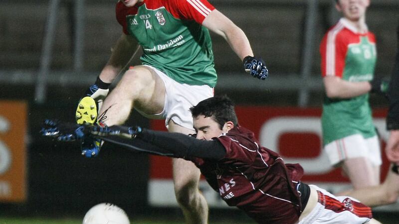 Declan Loye of St Paul&rsquo;s, Bessbrook blocks Jason Duffy&rsquo;s shot for St Patrick&rsquo;s, Armagh at the Athletic Grounds on Wednesday night<span class="Apple-tab-span" style="white-space: pre;">		<br /></span>Picture: Jim Dunne&nbsp;
