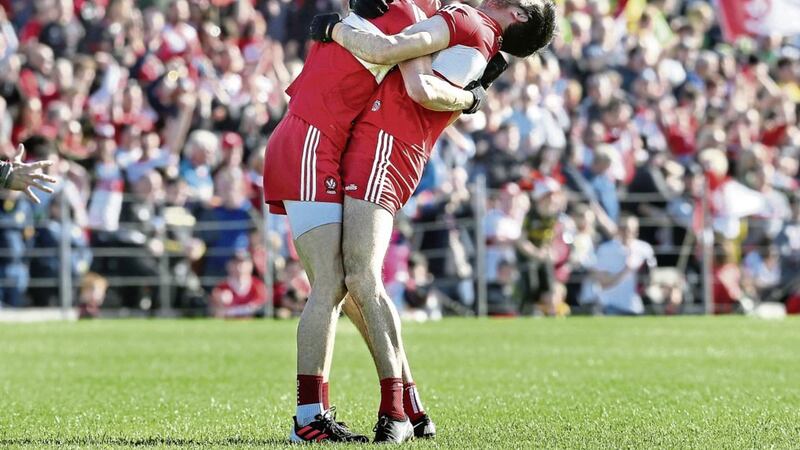 Derry captain Chrissy McKaigue and Brendan Rogers on the final whistle after beating Donegal during the Ulster Senior Football Championship Final at Clones on Sunday 29th May 2022. Picture Margaret McLaughlin 