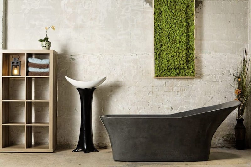 A concrete, self-heating, free standing bath tub with a $100,000 starting price 