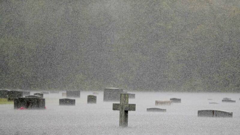 A flooded cemetery is seen during heavy rains from Florence in Marion, South Carolina Picture Gerald Herbert/AP 