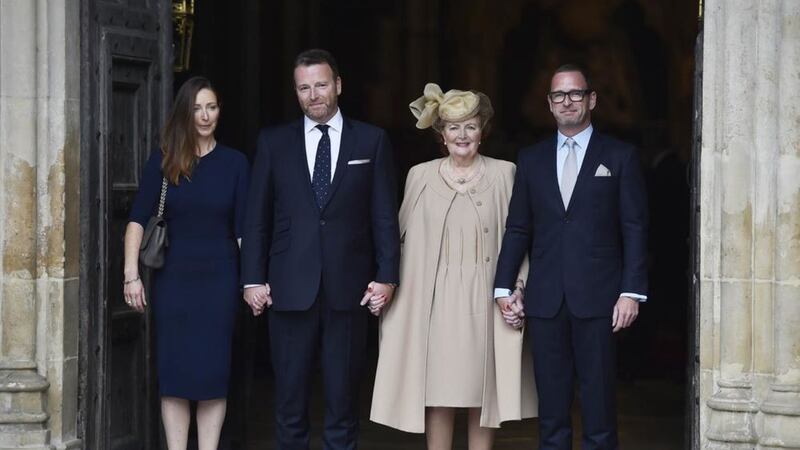 The family of Sir Terry Wogan, from left, daughter Katherine, son Alan, his widow Helen and their son Mark, as they stand together following his Service of Thanksgiving at Westminster Abbey, London. Picture by Hannah McKay, Press Assocation