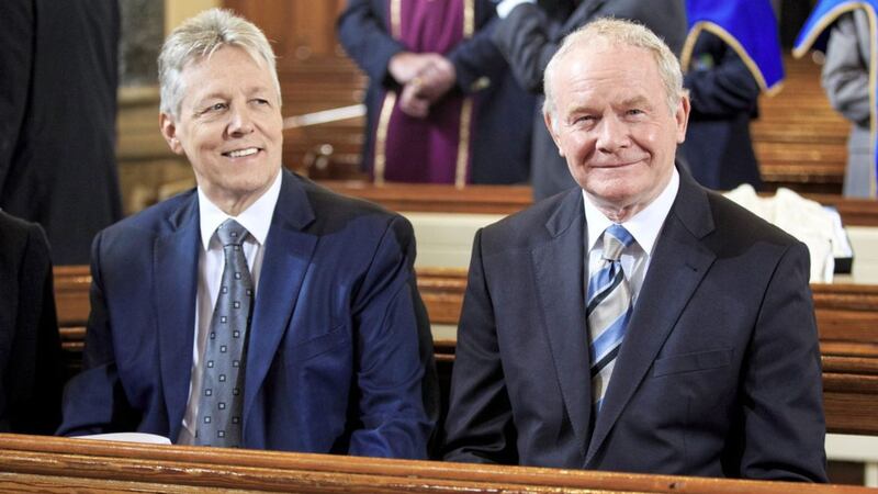 Former First Minister Peter Robinson and Deputy First Minister Martin McGuinness sit together in St Patrick&#39;s Church in Belfast during a visit by the Prince of Wales. Picture by Adam Gerrard/Daily Mirror/PA Wire 