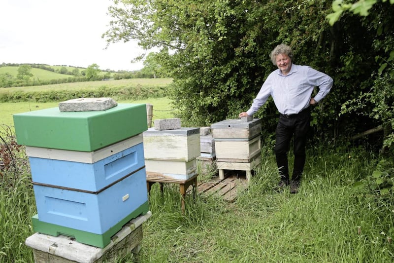 &nbsp;Dr McCaughey plans to spend more time tending to his four beehives in retirement. Picture by Hugh Russell