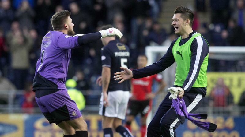 F<span style="font-family: Verdana, Arial, Helvetica, sans-serif; font-size: 13.3333px;">alkirk's Danny Rogers (left) celebrates at the end of the Scottish Championship match against Rangers</span>