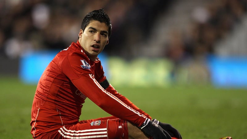 <span style="font-family: Arial, sans-serif; ">Uruguay and Barcelona striker Suarez, then a Liverpool player, clashed with Manchester United and France defender Evra during a 1-1 draw at Anfield on October 15 2011</span>&nbsp;