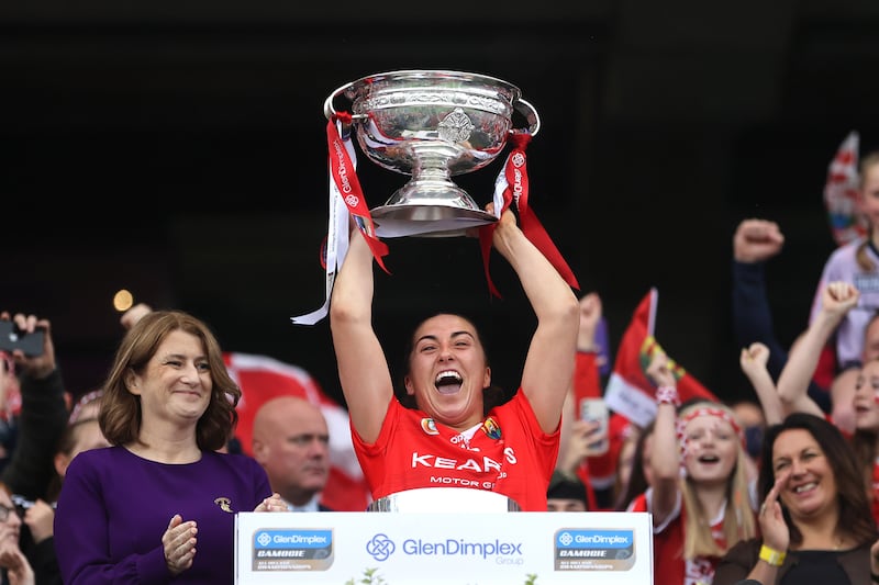 Amy O'Connor lifts the O'Duffy Cup after Cork's win over Waterford in the All-Ireland Senior Championship final.