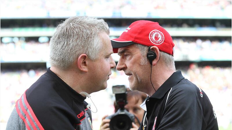 Tyrone manager Mickey Harte with Mayo selector Tony McEntee at the end of last Saturday's All-Ireland quarter-final &nbsp;