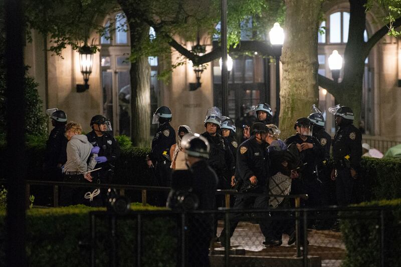 New York Police Department officers arrest Pro-Palestinian protesters at Columbia University (Marco Postigo Storel/AP)