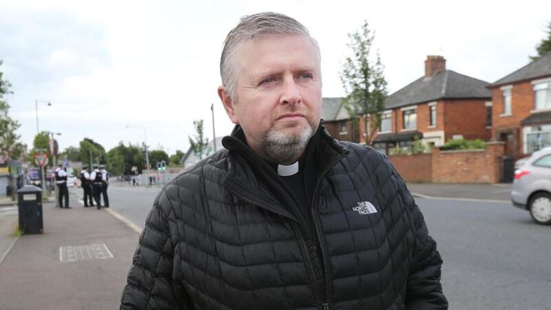 Fr Gary Donegan, rector of Holy Cross Church in Ardoyne, has called for Garc to call off its planned parade tonight  