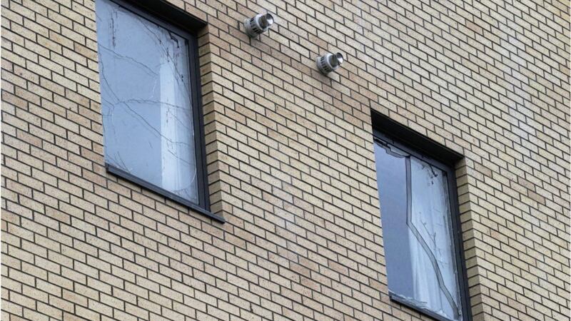Damage to windows of the Victoria Place apartment complex near Belfast&#39;s Sandy Row after last weeks bonfire. Picture by Hugh Russell. 