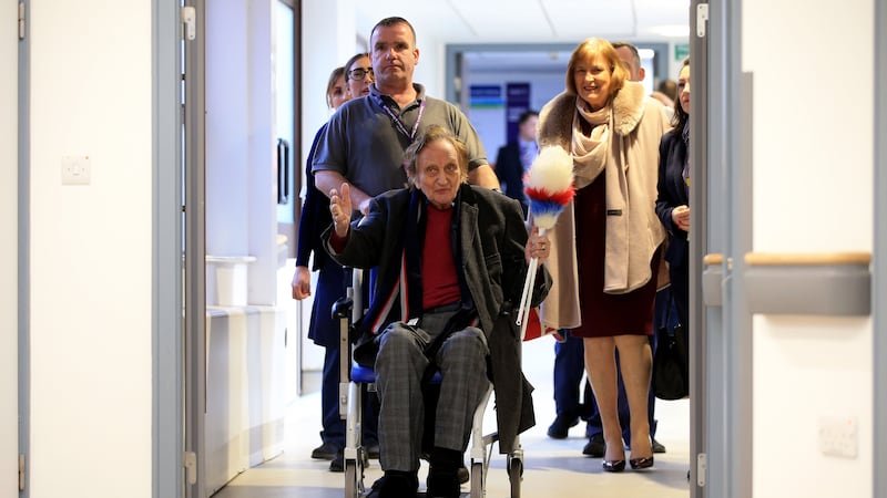 Brandishing a tickling stick, the 90-year-old comedian vowed to carry on with the gags as he left the Liverpool Heart and Chest Hospital.