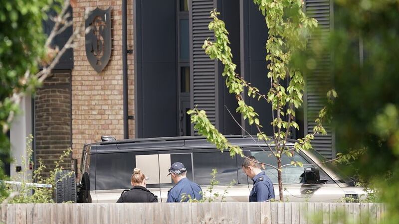 A Land Rover Defender is seen inside the grounds of the school in Camp Road, Wimbledon (PA)