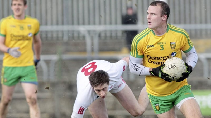 Donegal&#39;s Neil McGee with Colm Cavanagh of Tyrone during a 2015 clash at Ballybofey. Picture by Margaret McLaughlin 