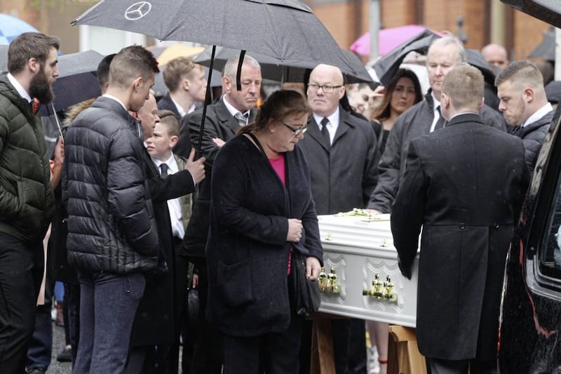 Carol Corr and other family members at the funeral of her daughter Joleen Corr outside St Paul&#39;s Church in west Belfast. Picture Matt Bohill 