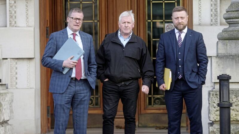 Michael Monaghan Snr at the High Court in Belfast, Michael&#39;s father in law was killed by the UVF in 1994, pictured with his legal team Kevin Winters and Setanta Marley. Picture by Mal McCann 