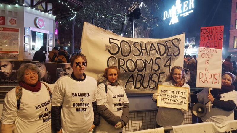Anti-abuse protesters lobby UK premiere of Fifty Shades Darker