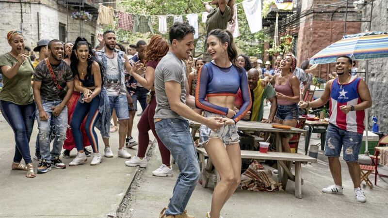 In The Heights: Anthony Ramos as Usnavi and Melissa Barrera as Vanessa 