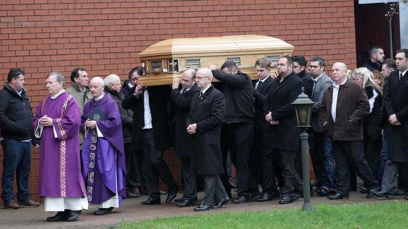 James McDonagh&#39;s coffin leaves Holy Family Church in Coalisland yesterday. Picture by Ann McManus 