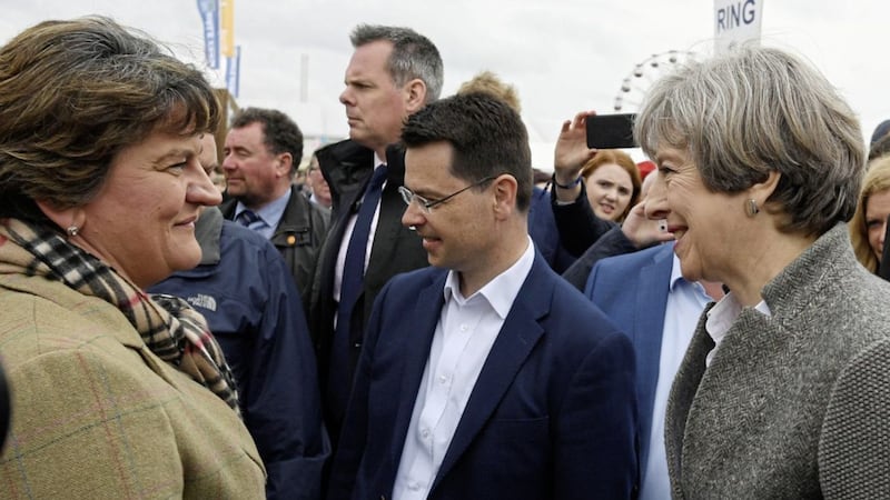 Prime Minister Theresa May and Secretary of State James Brokenshire meet DUP leader Arlene Foster during a visit to the Balmoral Show last month. Picture by Stefan Rousseau, Press Association 