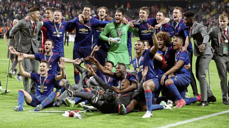 Manchester United players celebrate winning the UEFA Europa League final at the Friends Arena in Stockholm 