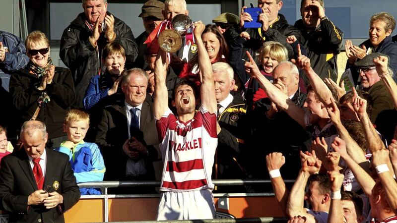 Slaughtneil captain Chrissy McKaigue celebrates with the AIB Ulster Club Hurling Club Cup after their victory over Loughgiel. Picture by Seamus Loughran