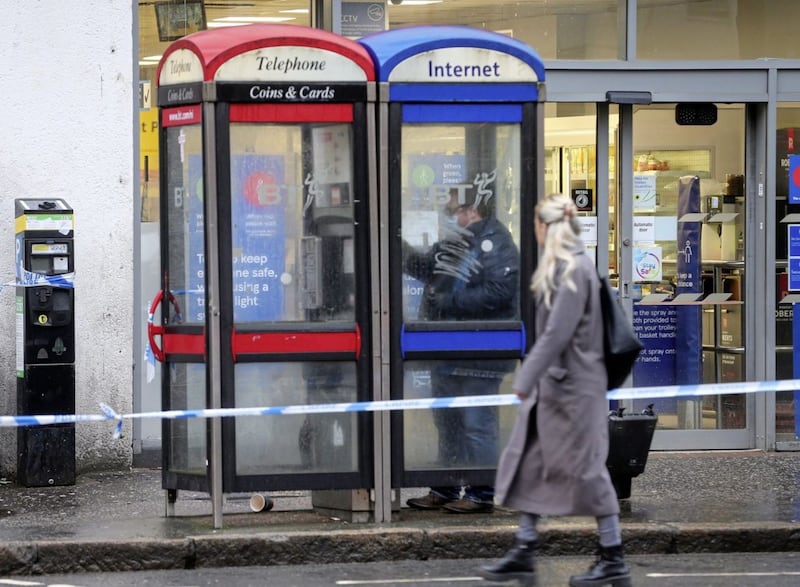 A phone box close to the scene of a cash-in-transit robbery at a Tesco Express store in Great Victoria Street in Belfast city centre. Picture by Mal McCann 