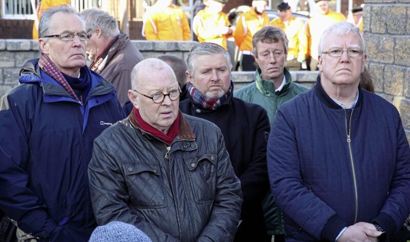 Veteran republican Joe Austin with Sinn Fein minister Gerry Kelly and Fr Gary Donegan at the unveiling of a memorial to those from the Ardoyne area who died during the Troubles. Picture by Cliff Donaldson.