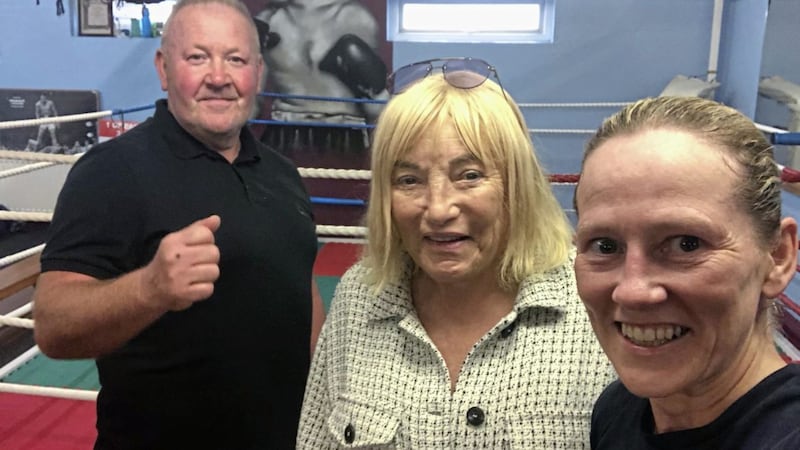 Kellie Maloney with Cathy McAleer and her coach Sammy Wilton at Eastside Boxing Club 