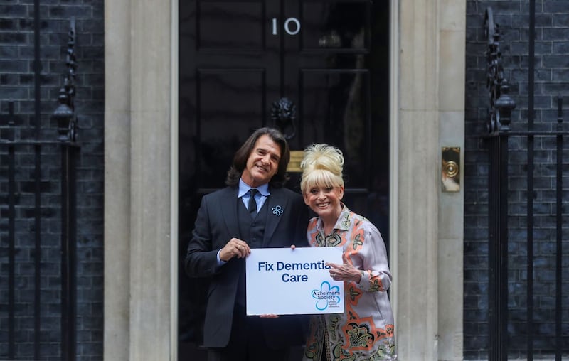Dame Barbara Windsor and her husband Scott Mitchell deliver an Alzheimer’s Society open letter to 10 Downing Street, calling on Prime Minister Boris Johnson to address the 