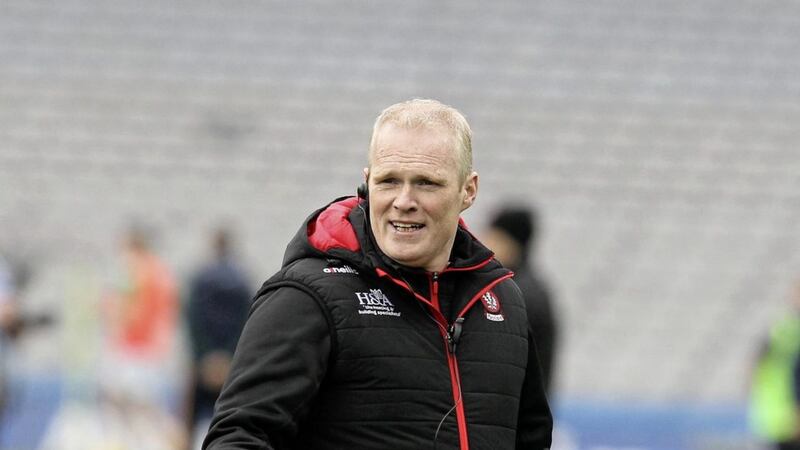 Derry Damian McErlain cited their opening day win over Antrim as crucial in gaining promotion 