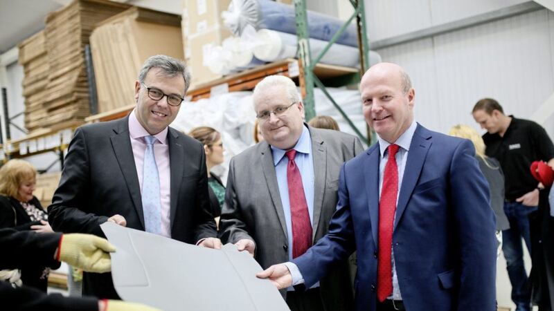 Manufacturing firm Bradfor Ltd has invested a substantial amount of money in their site in Rostrevo, with an extension to their facility and the addition of the very latest technology Pictured are chief executive of Invest Northern Ireland, Alastair Hamilton, with David Quin, Supply Chain Director of Rockwell Collins and Kevin McPeake, operations manager of Bradfor Ltd 