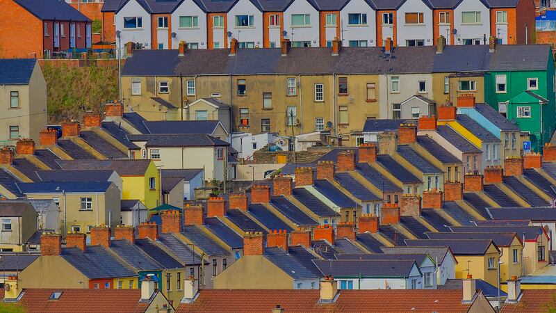 Derry city houses. In this picture, there is a residential area taken from the walls.