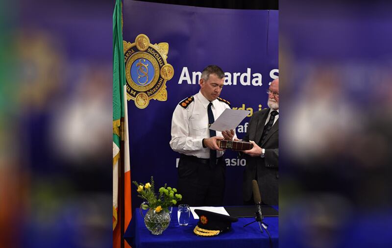 Garda Commissioner Drew Harris swearing an oath at Kevin Street Divisional Headquarters in Dublin today. Picture from Garda/ Press Association