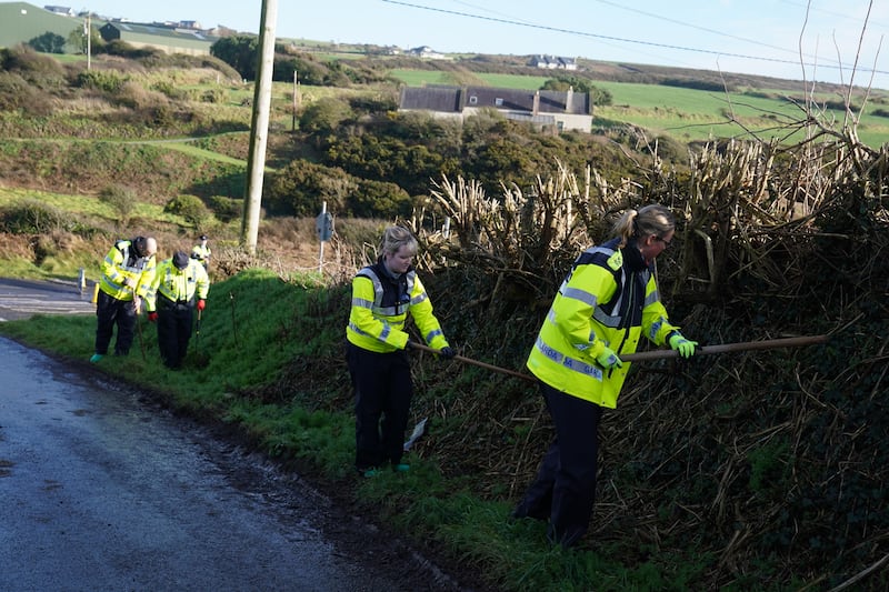 Garda search close to the scene in the Rathmoylan area of Dunmore East, Co Waterford, where they are investigating the death of a six-year-old boy
