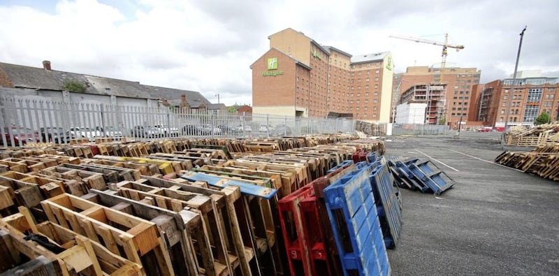 Pallets and other bonfire material being gathered near the Holiday Inn in south Belfast. Picture by Mal McCann 