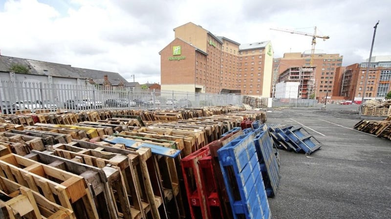 Pallets and other bonfire material being gathered near the Holiday Inn in south Belfast. Picture by Mal McCann 