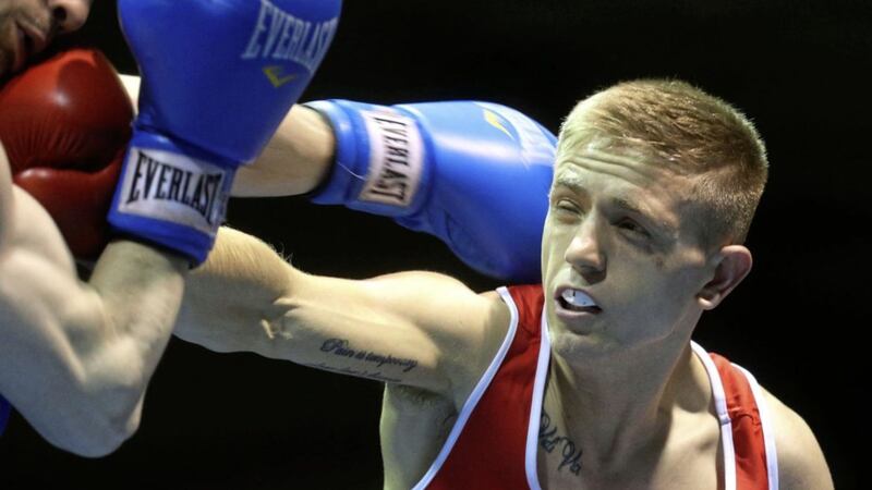 Kurt Walker on his way to a victory over Bakhtovar Nazirov in Dublin - a year after the Russian had beaten him at the European Games. Picture By Hugh Russell 