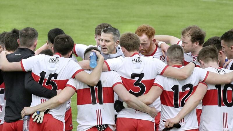 Rory Gallagher speaks to the Derry players after their win over Fermanagh at the weekend. The former Donegal and Fermanagh boss was characterised by the way his teams played in his earlier coaching days, but Derry are nothing like them at present. Picture by Margaret McLaughlin 