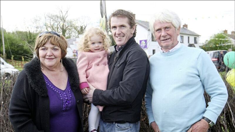 Tony McCoy with his mother Claire, daughter Eve and father Peader after his Grand national win in 2010 