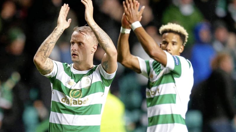 Celtic's Leigh Griffiths (left) and Scott Sinclair applaud the fans after the win over Astana