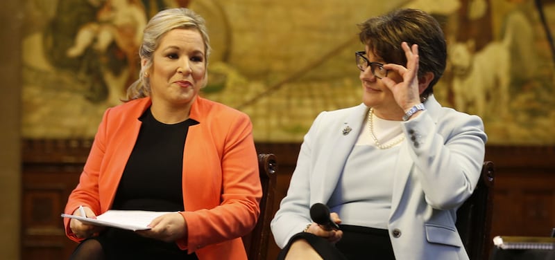 DUP leader Arlene Foster and Sinn F&eacute;in's leader in the north Michelle O'Neill smile during the Ulster fry breakfast at Manchester Town Hall during the Conservative Party Conference at the Manchester Central Convention Complex&nbsp;