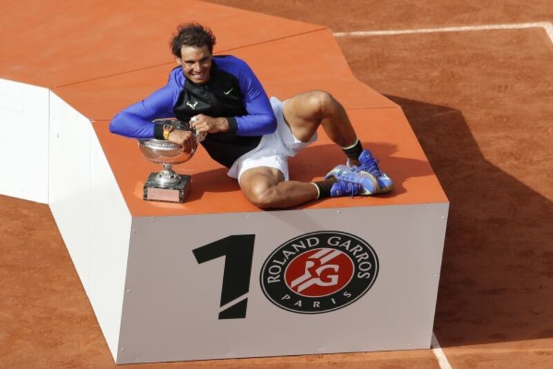 Rafael Nadal celebrates winning his 10th French Open title